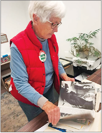 Fannie Watson combs through her Jimmy Carter memorabilia while recollecting the time she spent on his presidential campaign staff in the mid-’70s.