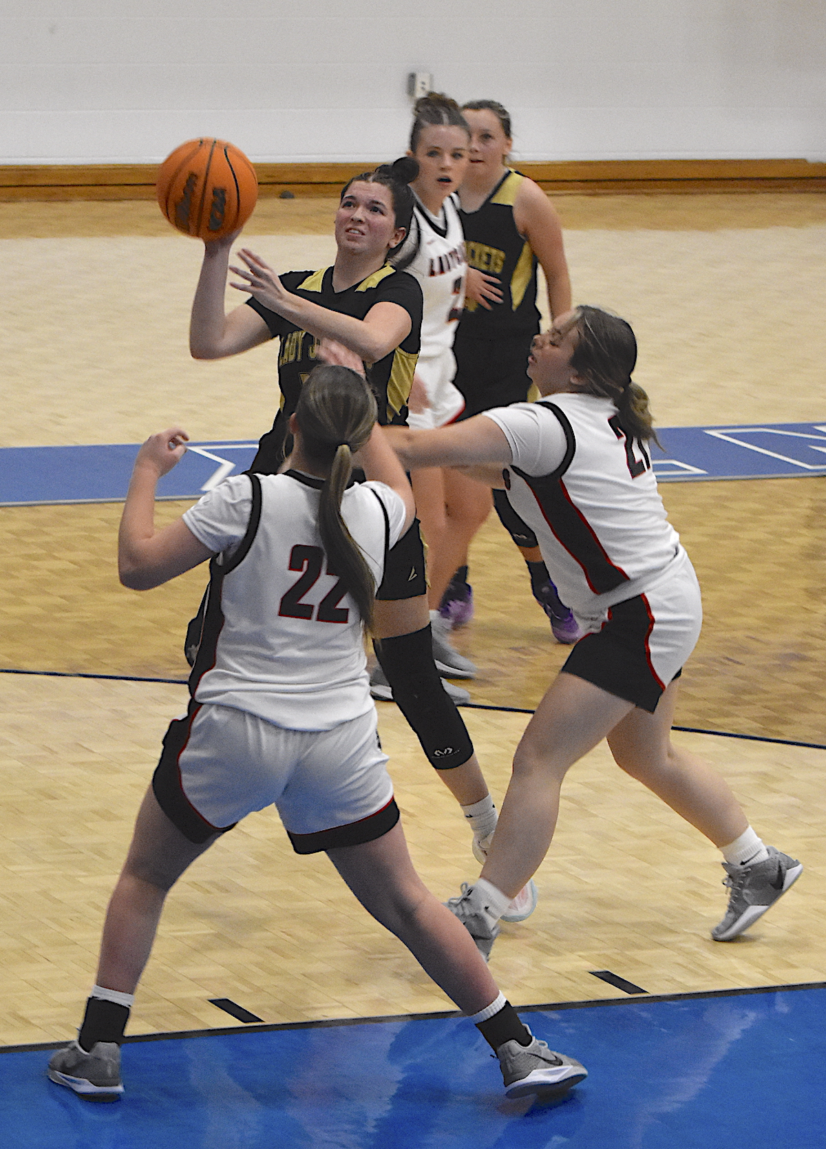Gary Corsair • Clay County Progress Hayesville's Bryleigh Krieger, No. 10, slips through the Rabun County defense for a bucket.