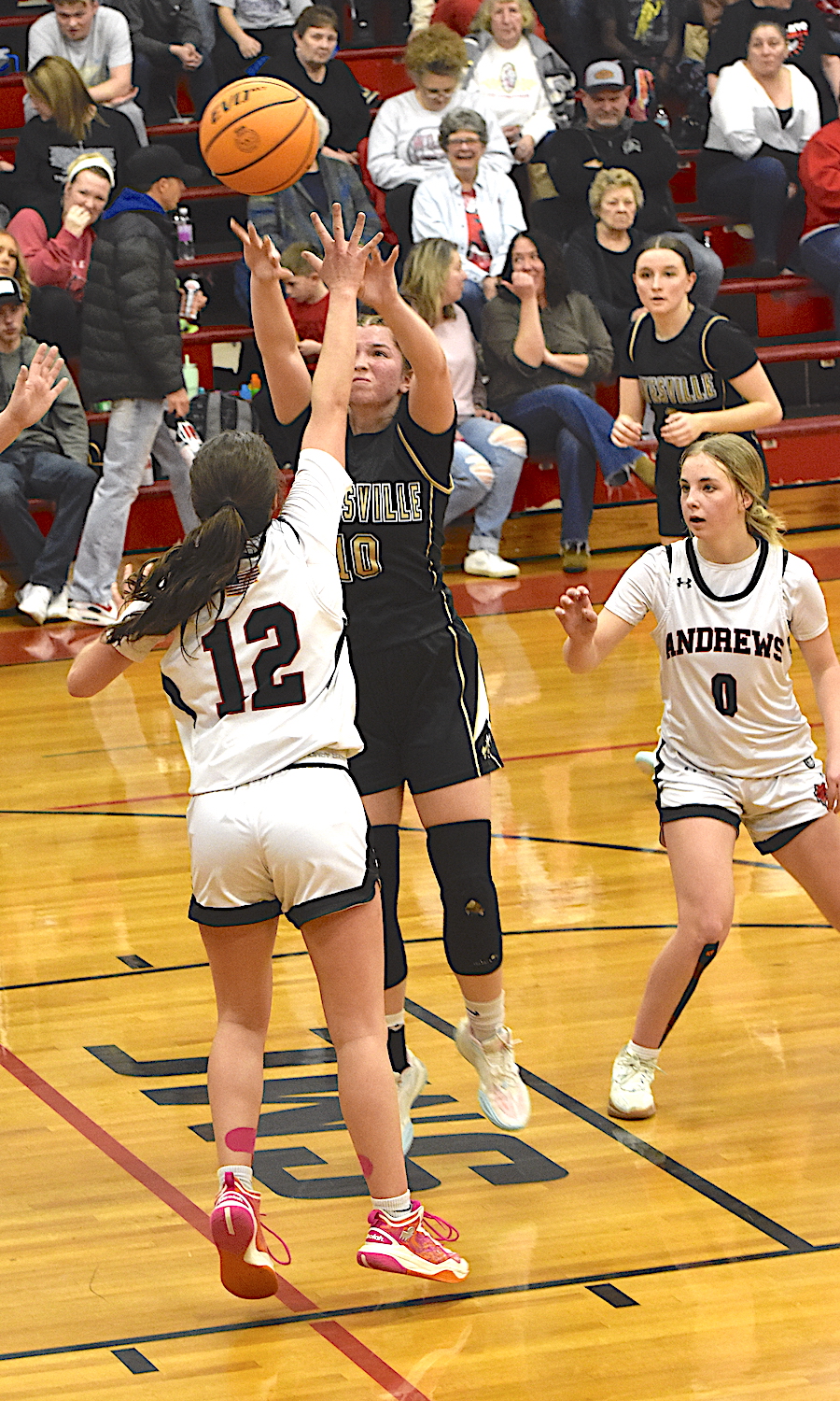 Gary Corsair • Clay County Progress Bryleigh Krieger, No. 10, drops two points in Hayesville's win over Andrews.
