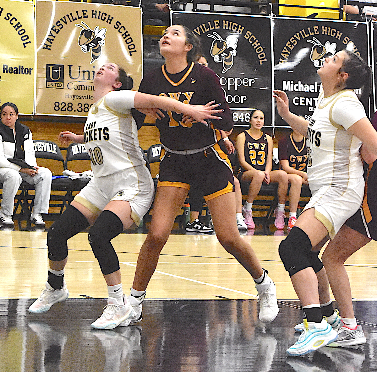 Gary Corsair • Progress Hayesville spark-plug Micallyn McClure, No. 10, zips a pass to the corner for the final shot of the game during a 32-29 overtime loss to Cherokee. Unfortunately, the Lady Jackets didn't get the tying basket.