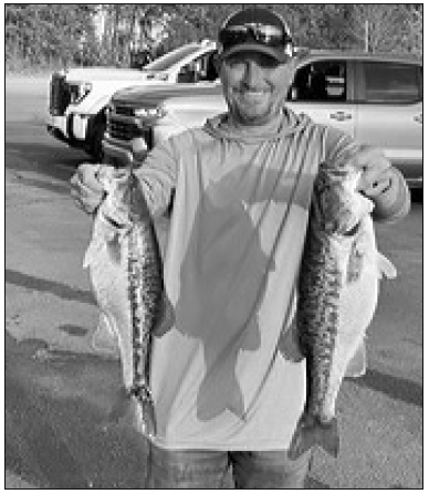 Jimmy Anderson holds a few of the catches that helped him take Big Fish and first place in the March tournament.