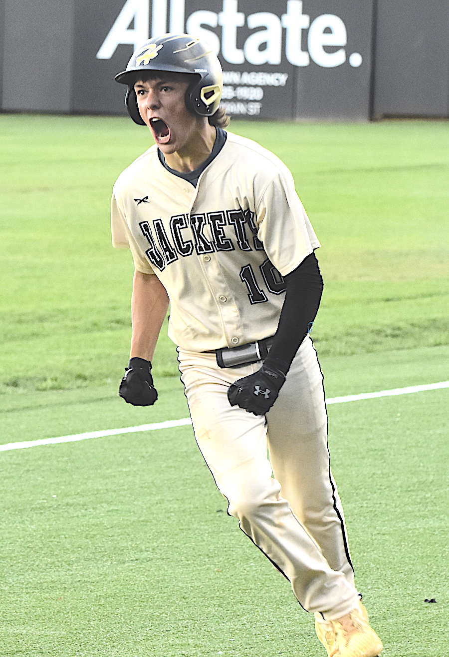 Photos by Gary Corsair • Clay County Progress Chance Hughes reacts to beating out a bunt for Hayesville's only hit of the game.