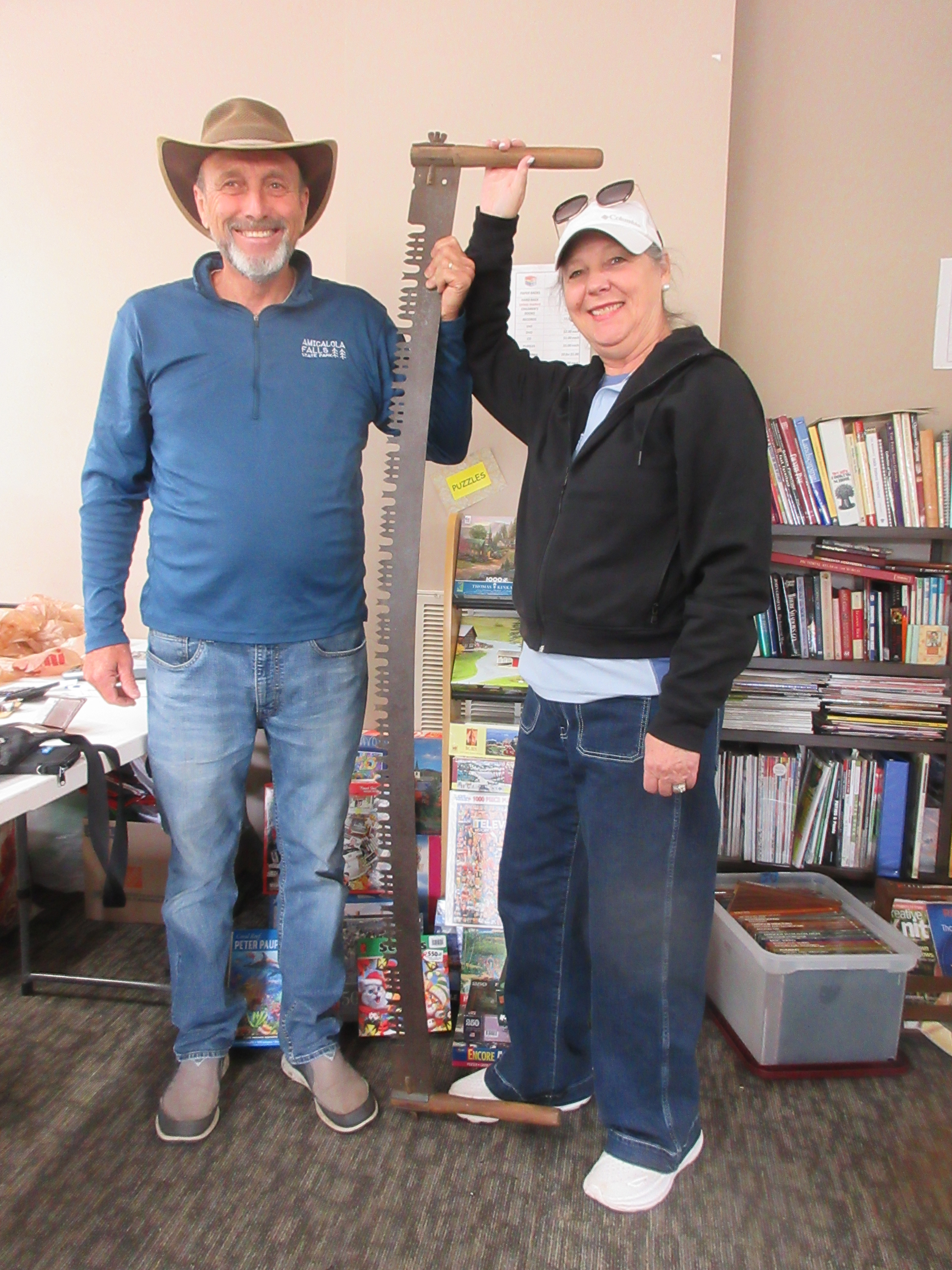 Terry and Cynthia Thamsley found an antique crosscut saw at Trash to Treasure to add to his tool collection.