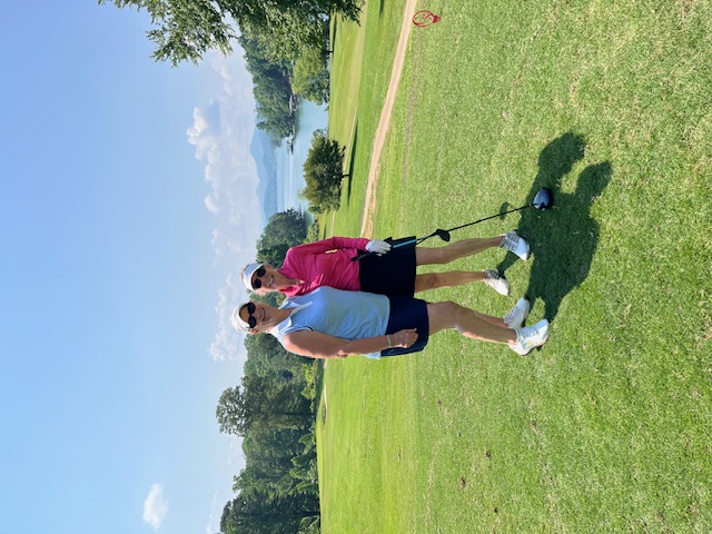 From left, Linda Miles and Judy Aube enjoy the blessings of a beautiful day on the golf course.