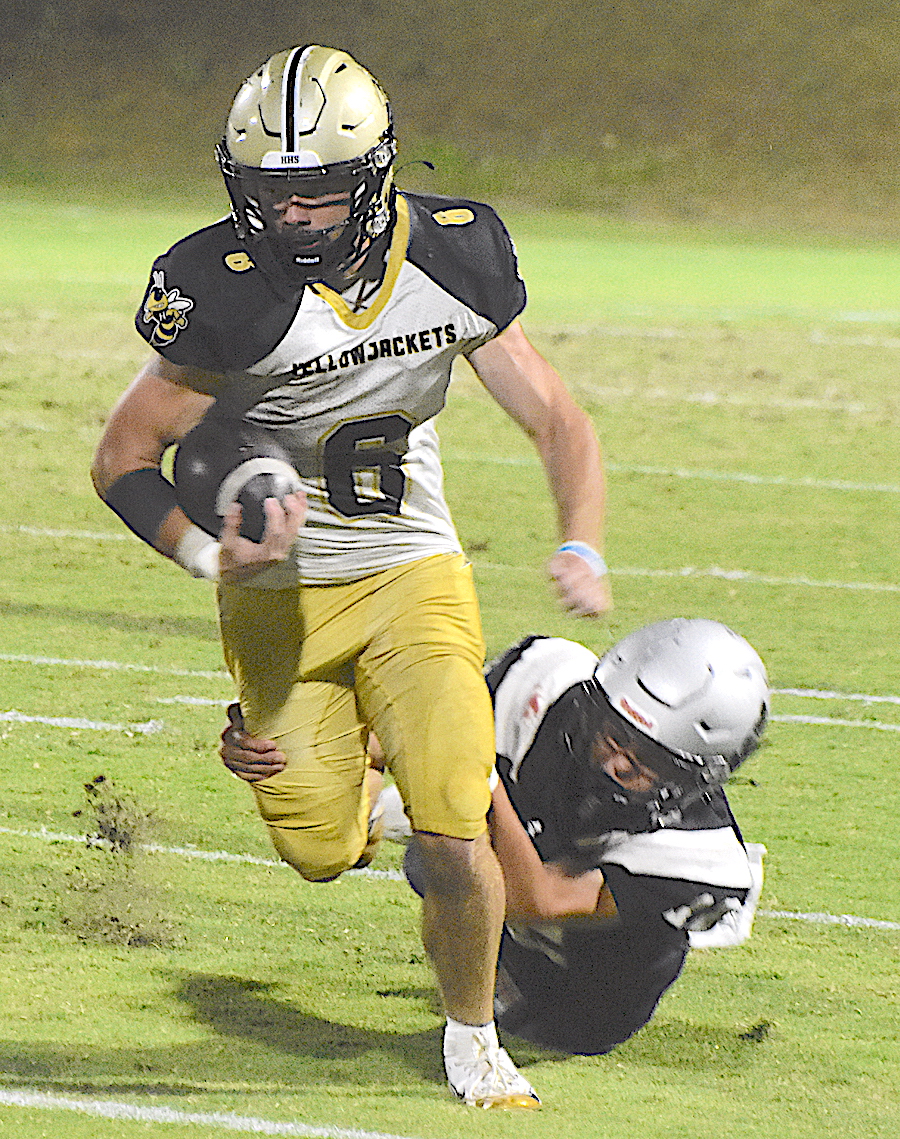 Gary Corsair • Clay County Progress Hayesville standout Tre Graves, 6, finds running room in the second half against the Black Knights.