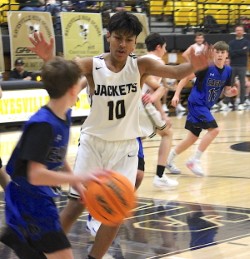 Photo-Neal Wachob Yellow Jacket Francisco Rios, No. 10, discourages an inbound pass. 