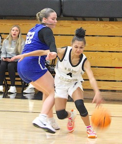 Photo-Neal Wachob Hayesville guard Kadence Morrow, No. 4, blows past a defender. 