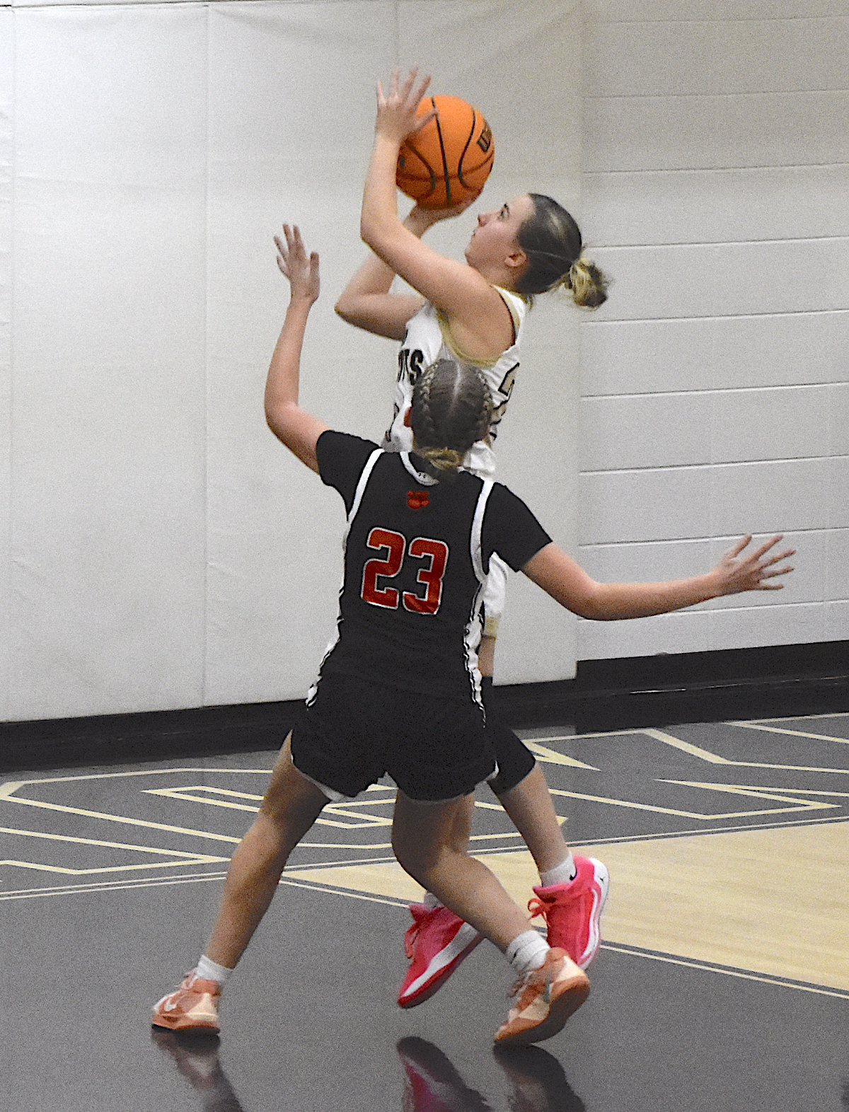 Gary Corsair • Clay County Progress Hayesville spark plug Caroline Wade, No. 24, cashes in a layup after stealing the ball from Rosman.