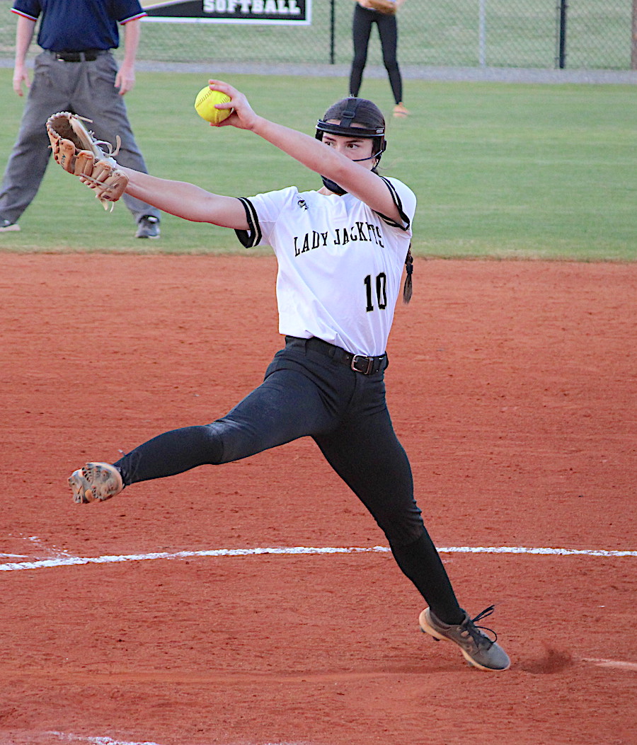 Neal Wachob • Clay County Progress Ace pitcher Micalynn McClure winds up to deliver.
