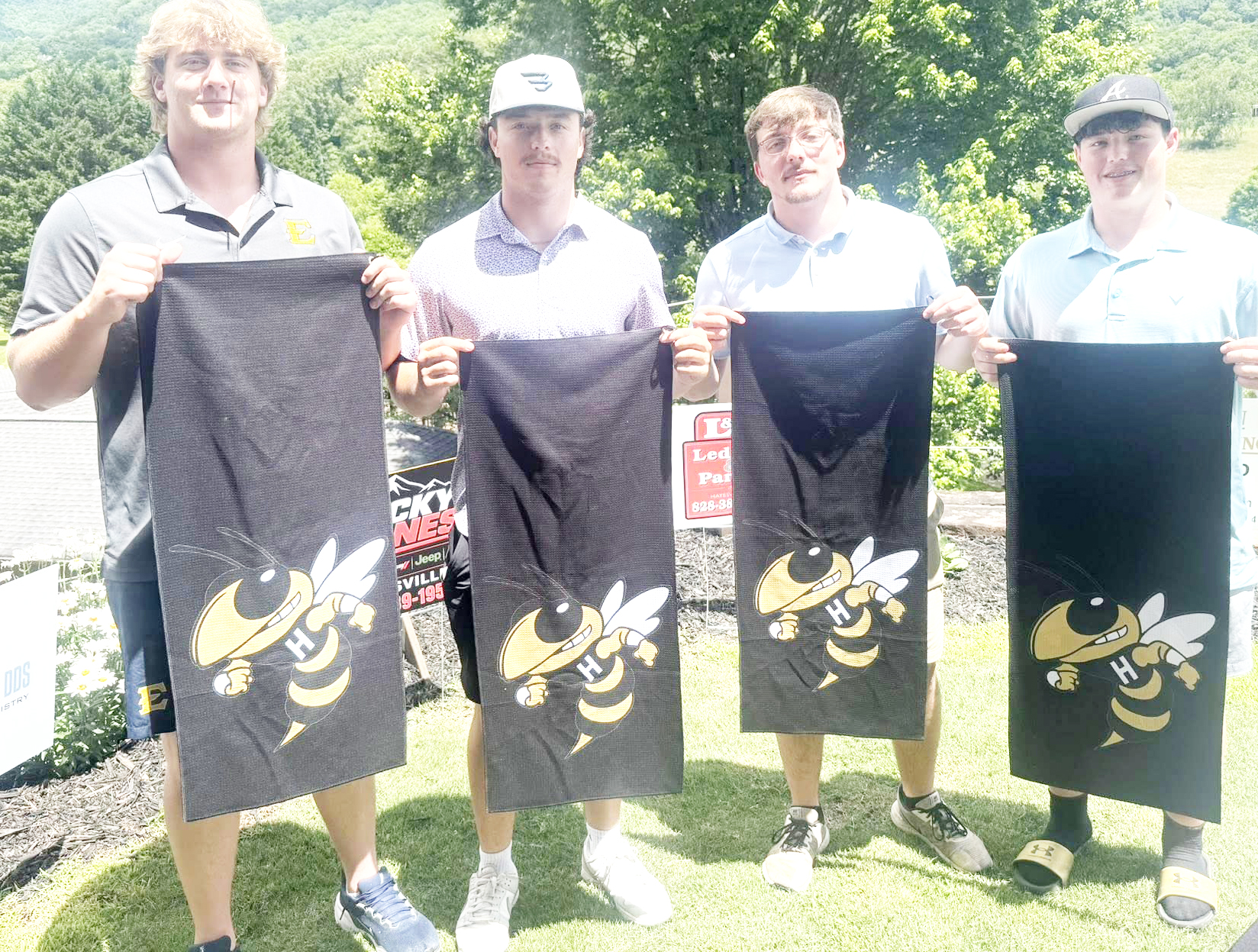 Brady Shook, Taylor McClure, Jacob Jones and Caden McClure won second place flight B in the golf tournament.