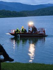 Emergency crews search for the body of Michael Picklesimer Tuesday, June 9.