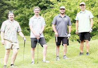 From left, organizer Ethan Taylor with his team Will Defee, Richard Defee and Z. Geraty.