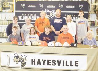 Front from left, Rhett, Tessa, Jackson, Joe Jack and Edna Mae Sellers; back Carrissa Daniels, Denise and Charlie Shelton, Rob, Marissa and Matthew Peck are witnessing Jackson's signing with Caldwell Community College.