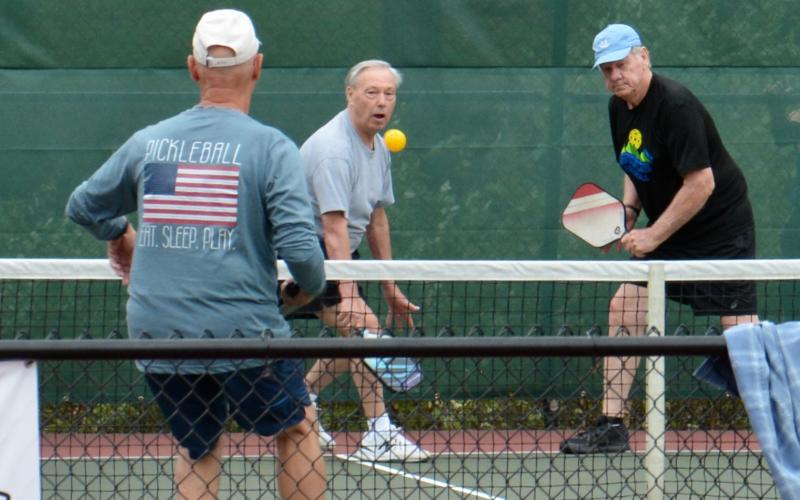 (Sally Brock • Clay County Progress) Fred Sickel, left and Steve Champ battle the competition on their way to gold in their age bracket.