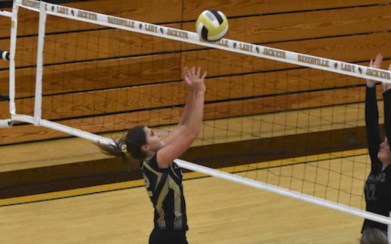Travis Dockery • Clay County Progress //  Katie Pierce slips a return just over the net in Hayesville’s battle with Union County.