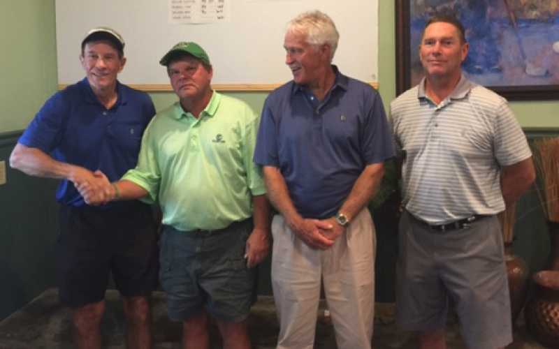 The tournament’s top performers take pause for recognition. From left, Senior winner Skip Goley, Senior runner-up, Steve Crayton, Championship winner Marvin Davenport and Championship runner up Matt Rogers.