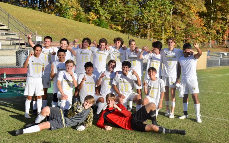 (Karen Dudley • Submitted)  Hayesville’s men’s soccer team celebrate their SMC championship after their win over Swain. First row, from left, Connor Rexroad and Kylan Bunch. Second row, Jose Constantino, Je erson Hernandez, Will Gordon, Javier Bustamante, Lee Anderson, Ayeden Richbourg and Blake Owens.Third row, Anthony Ashley, Isaiah Michael, Jacob Rogers, Mason Norris, Jared Welch, Zane Lucksavage, David Green, Ryelan Snowden and Omar Fonceca.