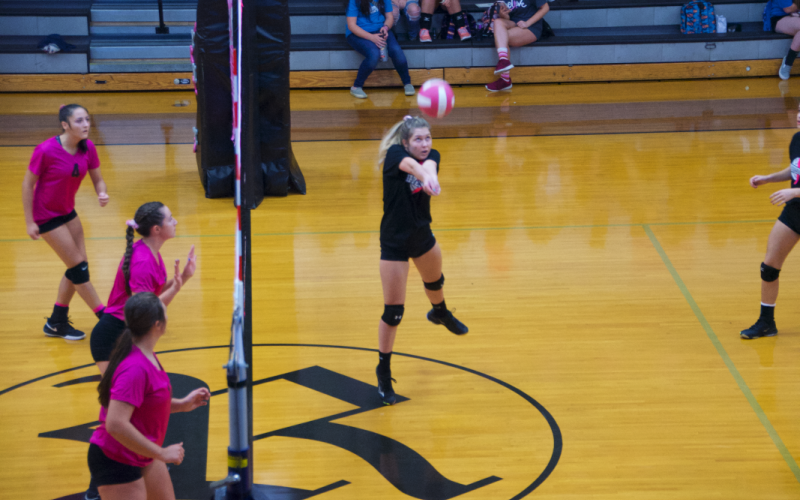 (Kevin Hensley • Graham Star) Emily Byers sends up one of her 10 assists against the Lady Knights.