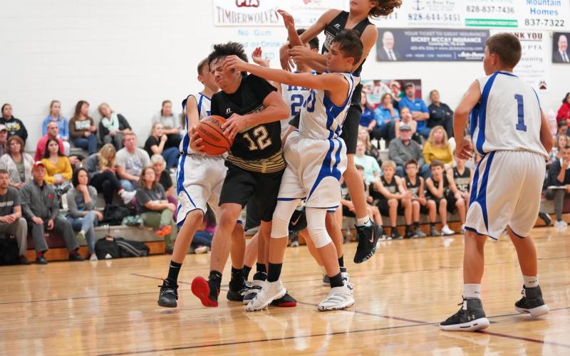 (Kelli Graves  • Clay County Progress) Things get physical as Seth Leek tries to create space Thursday.