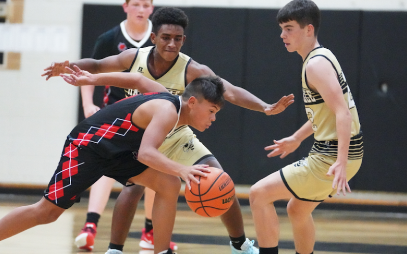 (Kelli Graves • Clay County Progress) Asher Brown, left, and Jacob McClure seal off the lane in Hayesville’s season-opening win.