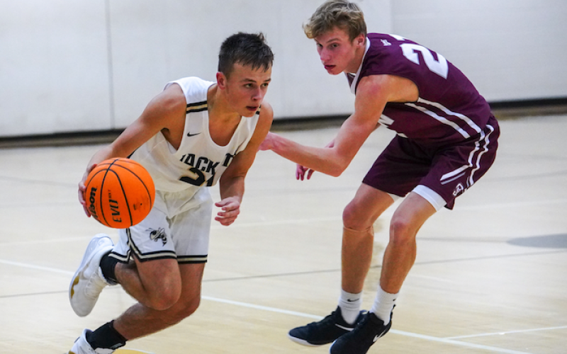 (Kelli Graves • Clay County Progress) Eli Roberts uses his speed to break free of a Swain County defender.