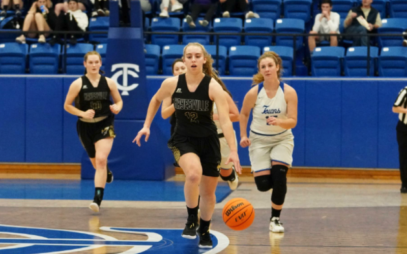 (Kelli Graves / Clay County Progress) Lila Payne breaks free and heads to towards the basket against Towns County.