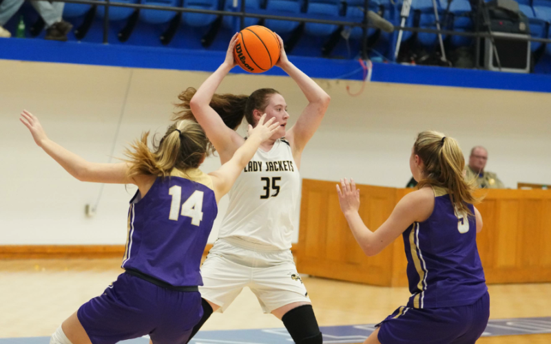 (Kelli Graves / Clay County Progress) Hayesville's Brianna Foster draws a double team against Lumpkin County.