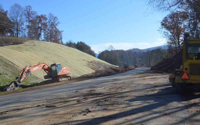 (Lorrie Ross • Clay County Progress) Modernization has begun on NC Highway 175, which travels south into Hiawassee, Ga. Construction equipment has been present on that road for several months, especially near the High Bridge where this picture was taken. Expect the heavy equipment to remain on site for a while since the scheduled completion date is not until Oct. 1, 2021.