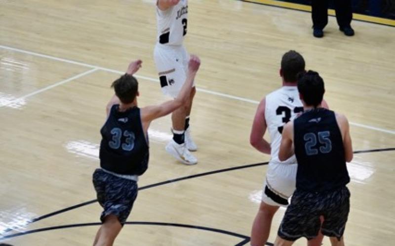 Photo by Kelli Graves / Clay County Progress: Mark Cothren floats in the lane for a jumper against Robbinsville.
