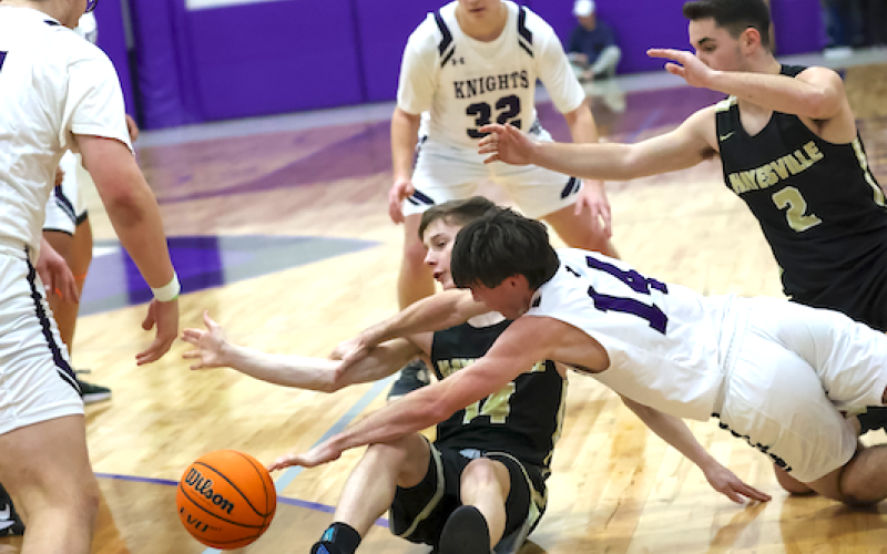 Kolbe Ashe finds himself in a rugby scrum fighting for a loose ball.