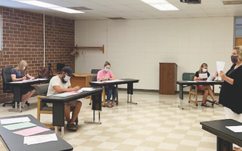 Pre-Kindergarten Director Lisa Chambers discusses the upcoming school year during a meet the teacher event Wednesday morning. The school year will look much different as Clay County and the state function under reopening guidelines. Clay County Schools will be open for business Aug. 17 and there are still technicalities to work out. Parents will be receiving a survey in the next week or so.