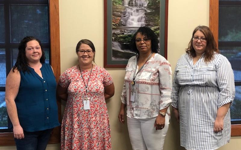 Lorrie Ross • Clay County Progress North Carolina Department of Health and Human Services has officially designated child protective and adult protective services social workers as first responders. Clay County’s Child Protective Services Social Workers, from left, Jennifer White, Katie Brown, Jeryl Holbrook and CPS supervisor Haven Phillips. Scott Whitaker was not present for the photo.