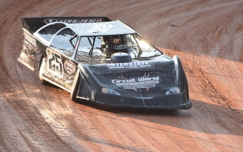 Travis Dockery • Clay County Progress Modified Hobby feature winner Jacob Hamby exits turn four and powers down the front stretch.