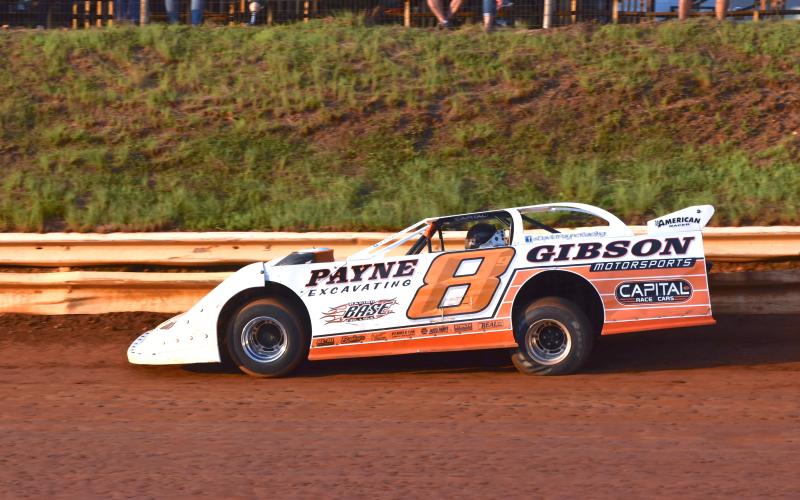 (Travis Dockery • Clay County Progress) David Payne speeds down the straightaway as the eventual winner turns practice laps.