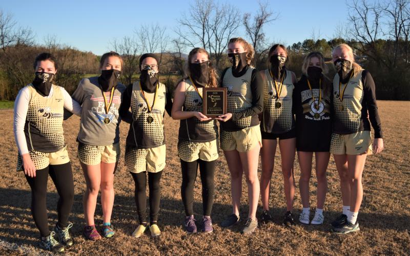 (Zach Moss • Submitted) The Lady Jackets celebrate their win. This year’s team is made up of, from left, Meg Barton, Lila Roberts, Makayla Kaiser, Allison Thomas, Elizabeth Beck, Kaysen Krieger, Caroline Burch and Cecelia Jones