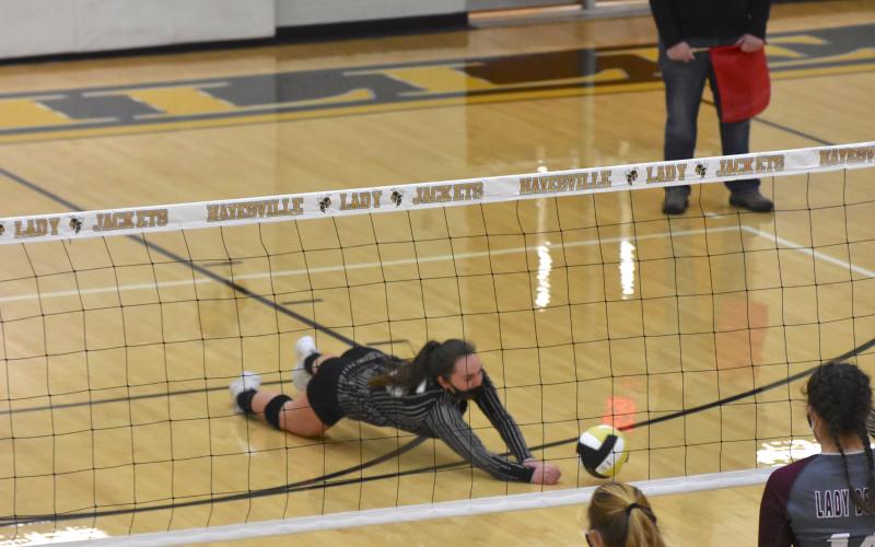 (Travis Dockery • Clay County Progress) Senior Maggie Plemmons comes up just short in keeping the ball from hitting the floor