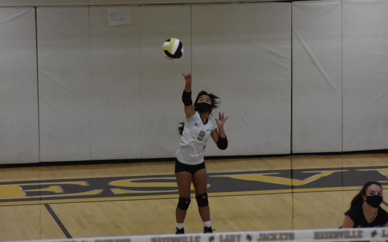 (Travis Dockery • Clay County Progress) Pheobe Pietela fires off a serve for one of her two aces in Hayesville's win over Andrews.