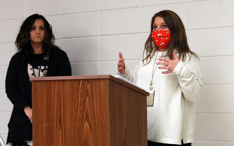 (Jared Putnam • Clay County Progress) Hayesville Elementary School counselor Quincey PattersonRickett speaks while Hayesville Middle School counselor Emily Hedden looks on during the Clay County Board of Education meeting on Monday in Hayesville. PattersonRickett and Hedden spoke to the board about a school-based mental health policy.