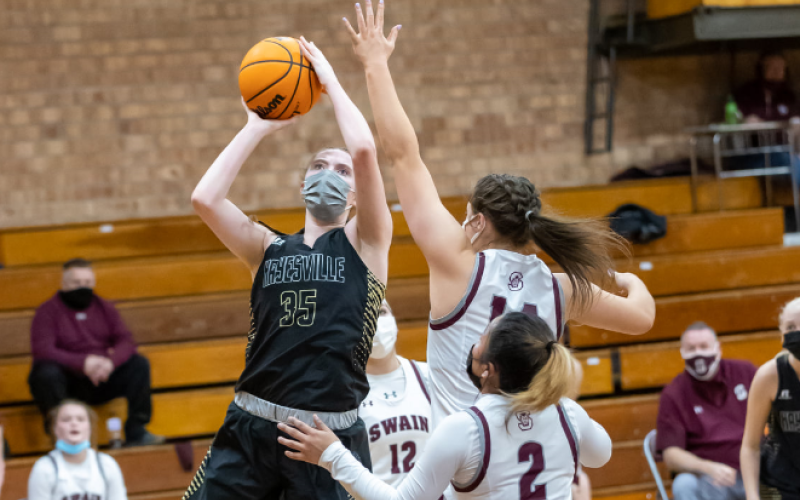 (Kelli Graves • Clay County Progress) Brianna Foster battles under the basket for 2 of her teamleading 20 points.