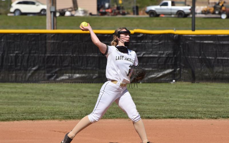 (Travis Dockery • Clay County Progress) Lady Jacket second baseman Lila Payne snags a grounder and fires to first for an out.