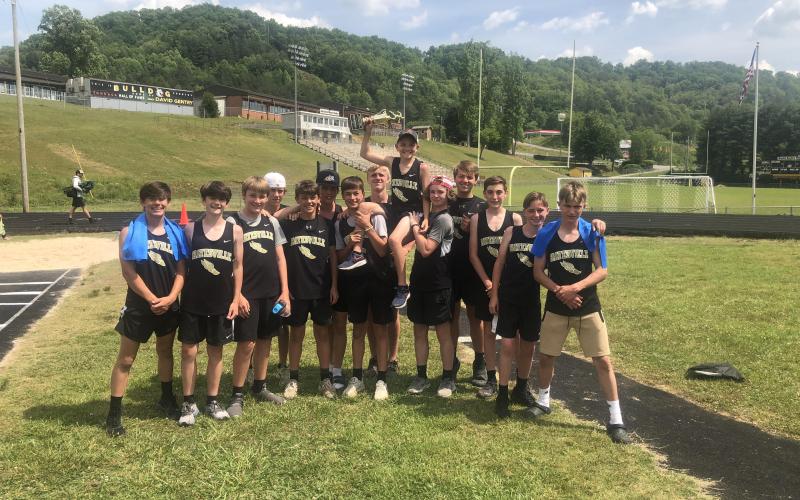 (Submitted • Brett Graves) The HMS Yellow Jackets celebrate their Smoky Mountain Conference championship. From left, Micheal Mauney, Cannon Brewer, Eli Chandler, Kendall Boyer, Chance Hughes, Kyle Shaheen, Tate Roberts, Johan Webb, Parker Hughes, Kenyon Rogers, Landon Trout, Tyler Fuller, Nick Wilson and Daniel Allen.