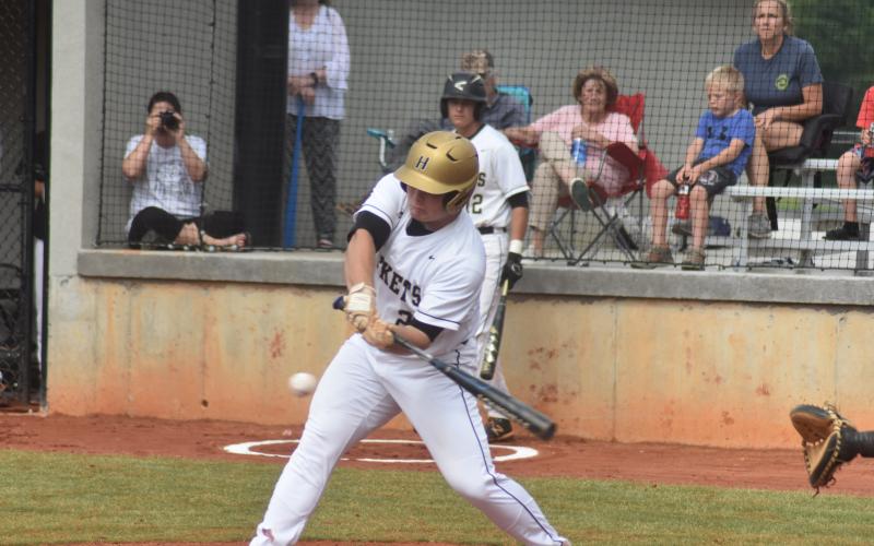 Leadoff man Connor Bradley likes the first pitch he sees and swings away.