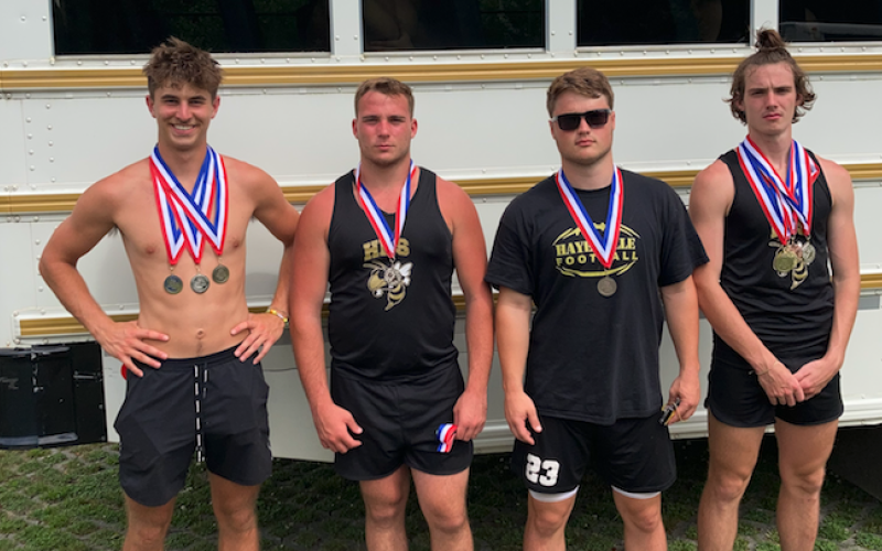 Seniors, from left, Brady Shook, Ethan Taylor, Blake McClure and Paul White show off their SMC medals.