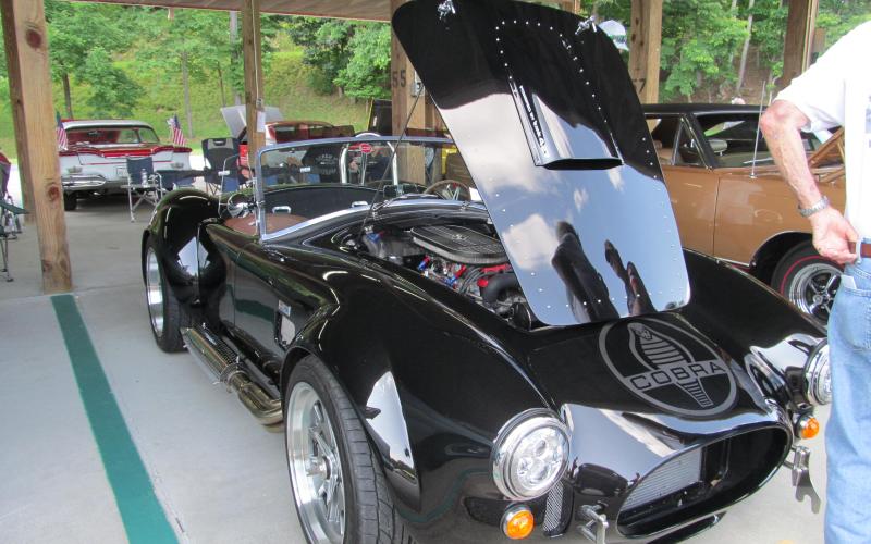 Dick Couture • Submitted Bill Henry’s Ford Cobra attracts a crowd and goes home with a “Club Choice” trophy.