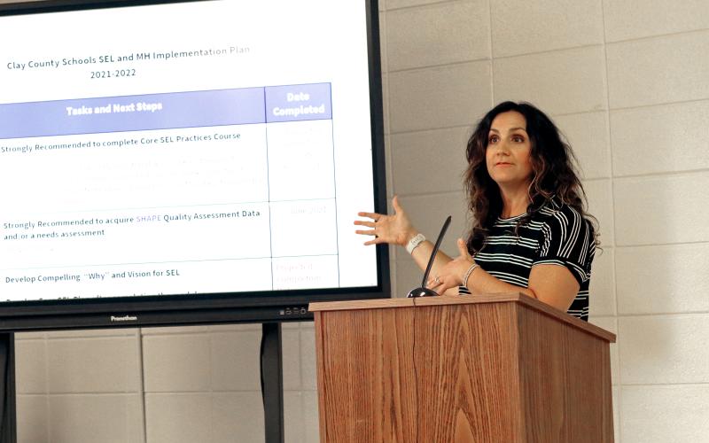 (Jared Putnam • Clay County Progress) Emily Hedden, Clay County Schools' Social-Emotional Learning Coordinator, presents details of the school-based mental health plan to the board of education during the June meeting on Monday in Hayesville.