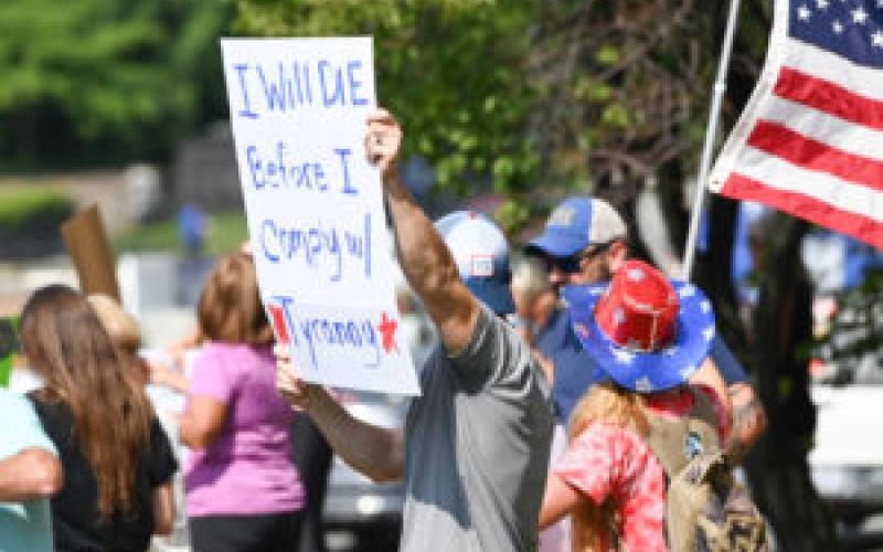 Protesters lined up at Duke Health in Durham to demonstrate their objection to vaccine mandates for employees. (Photo by Maya Reagan, Carolina Journal)