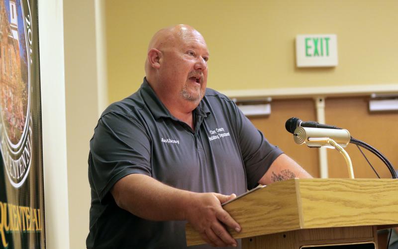 Clay County Building Inspector Anthony Stillwell discusses a fee schedule for permits related to the Residential Park Development Ordinance during the board of commissioners meeting on Aug. 5 in Hayesville.