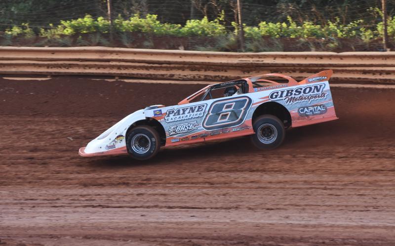 (Photo by Travis Dockery) "The Coach" David Payne puts his No.8 through its paces during practice laps for the "Clarence Barnett Memorial" Super Late Model race. Payne was able to hold off hard chargers to pick up the victory.