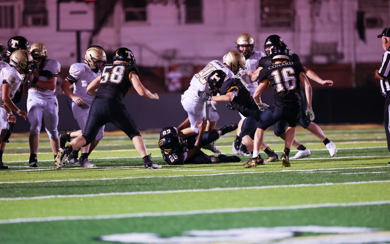 Photo by Kelli Graves Hayesville running back Taylor McClure fights to stay on his feet against Tuscola.