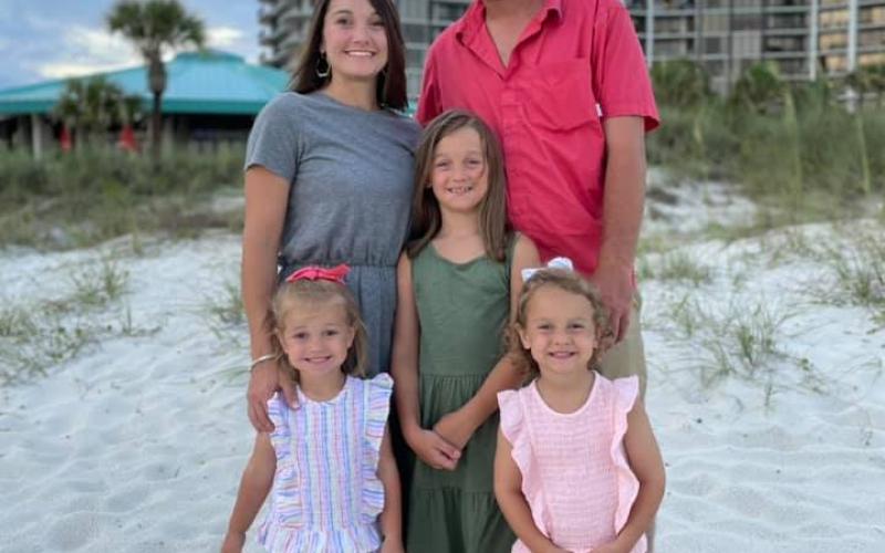 Clay County Health Department Interim Health Director Clarissa Rogers enjoys family time at the beach with her husband and high school sweetheart Robert Rogers and their three daughters: Emma Grace, Anna Kate, and Cara Lynn.